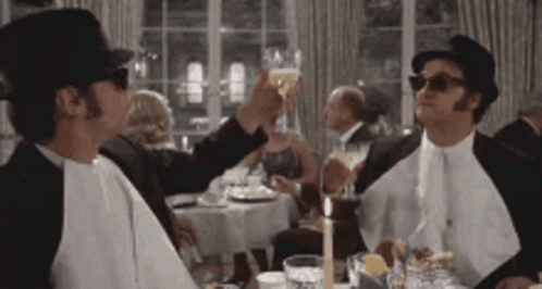 Two Men Toasting with Champagne