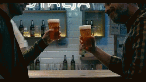 Two Men Toasting With IPA Beer