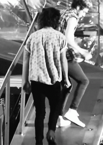 Two Men Walking Down Stairs Black And White GIF