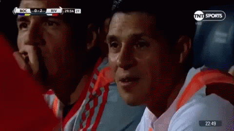Two Men Watching Soccer Match GIF