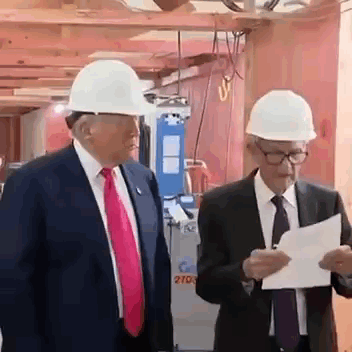 Two Men Wearing Hard Hats And Ties Are Standing Next To Each Other In A Building . GIF