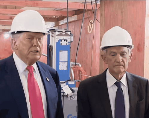 Two Men Wearing Hard Hats Are Standing Next To A Machine That Says Be On It GIF