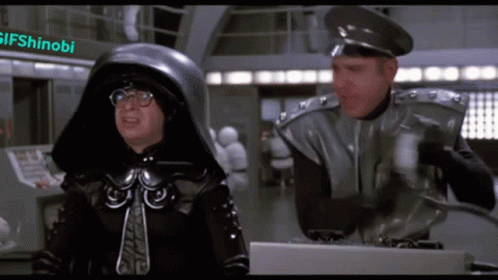 Two Men Wearing Helmets and Glasses