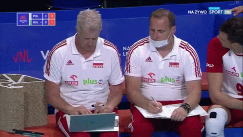 Two Men Wearing Polo Shirts With The Word Polska On It GIF