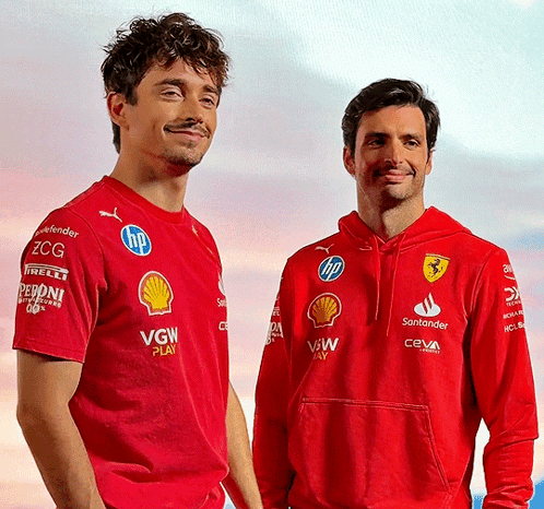Two Men Wearing Red VGW Shirts