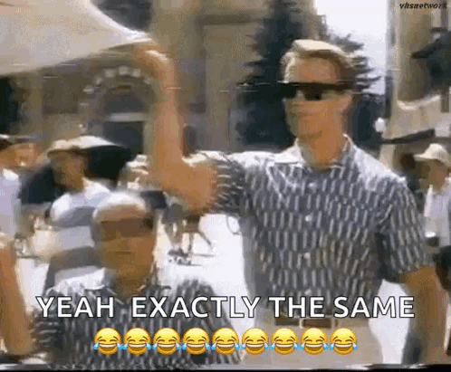 Two Men Wearing Sunglasses Are Standing Next To Each Other And Laughing . GIF