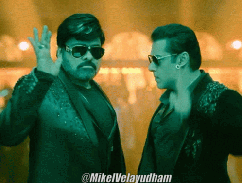 Two Men Wearing Sunglasses Are Standing Next To Each Other And The Caption Says @Mikelvelayudham GIF