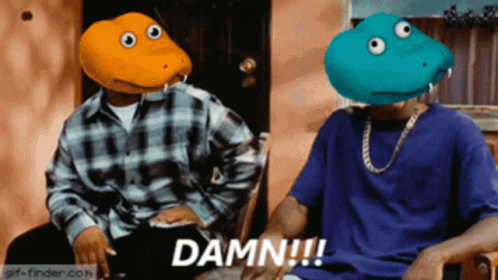 Two Men With Cartoon Characters On Their Heads Are Sitting Next To Each Other And One Of Them Says Damn !!! GIF