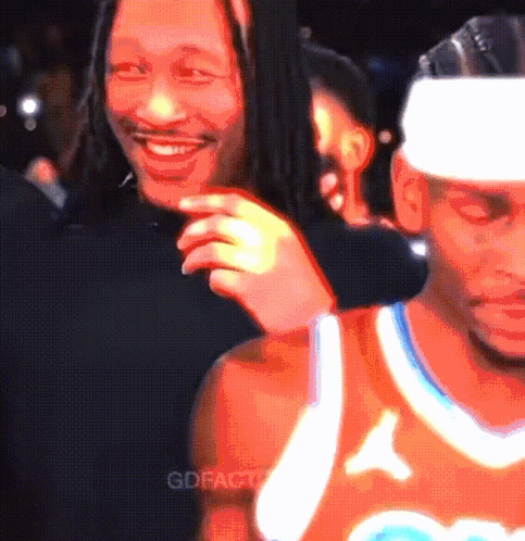 Two Men With Dreadlocks, One With Headband Smiling