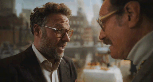 Two Men With Glasses And Mustaches Talking GIF