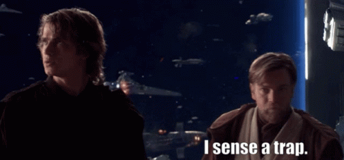 Two Men With I Sense A Trap Text