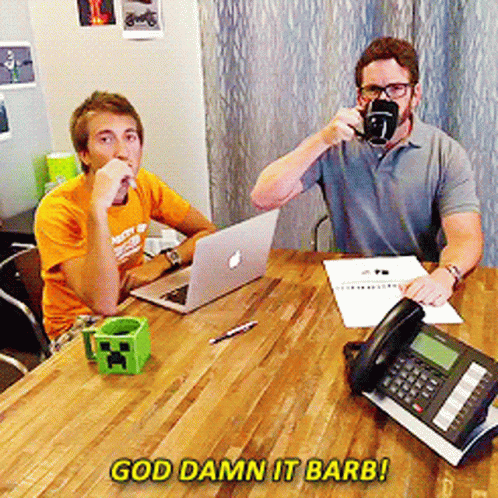 Two Men With Phone and Laptop Saying God Damn It Barb