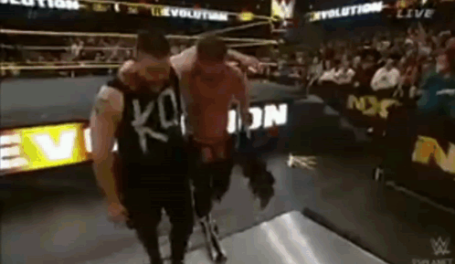 Two Men Wrestling in Ring