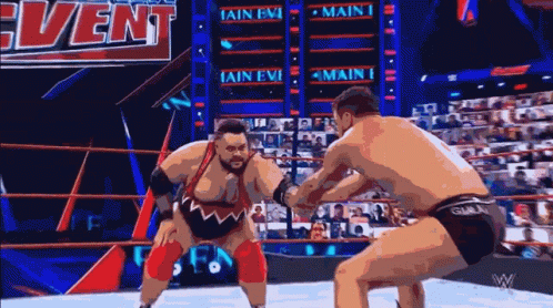 Two Men Wrestling in Ring