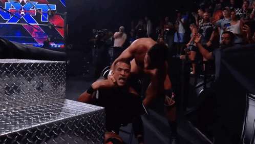 Two Men Wrestling In Ring GIF