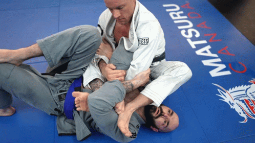 Two Men Wrestling on Matsuri Canada Mat