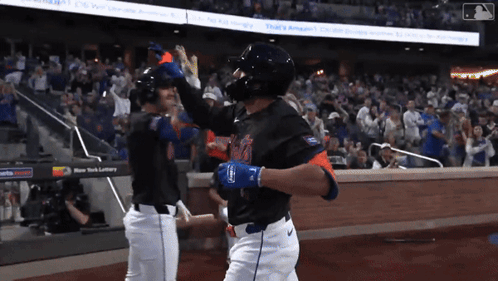 Two Mets Baseball Players High Five