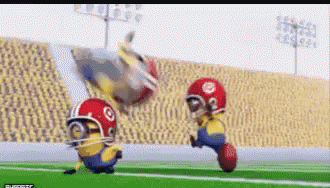 Two Minions Playing Football