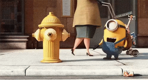 Two Minions Standing Next To Yellow Fire Hydrant GIF