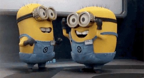 Two Minions Wearing Goggles And Overalls With Letter C GIF