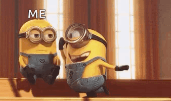 Two Minions Wearing Goggles Are Standing Next To Each Other And Talking To Each Other . GIF