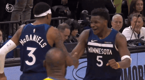 Two Minnesota Basketball Players Shake Hands GIF