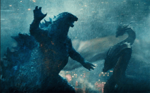 Two Monsters Are Fighting In The Water And One Of Them Is A Snake GIF