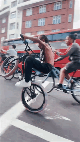 Two Motorcycle Riders on Road With Bravas