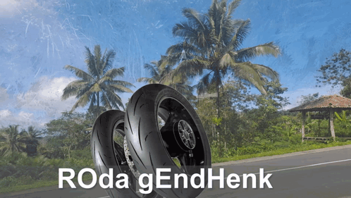 Two Motorcycle Tires On A Road With Roda Gendhenk Written In White GIF