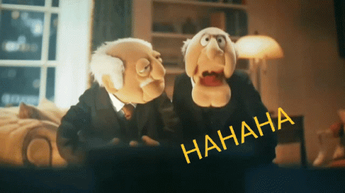 Two Muppets Are Laughing In Front Of A Screen That Says ' Hahaha ' On It GIF