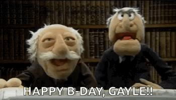 Two Muppets Are Sitting At A Table And Saying Happy B-Day Gayle ! GIF