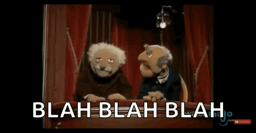 Two Muppets Are Sitting At A Table With The Words Blah Blah Blah Written On The Screen GIF
