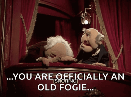 Two Muppets On A Balcony With The Words " You Are Officially An Old Fogie " Above Them GIF