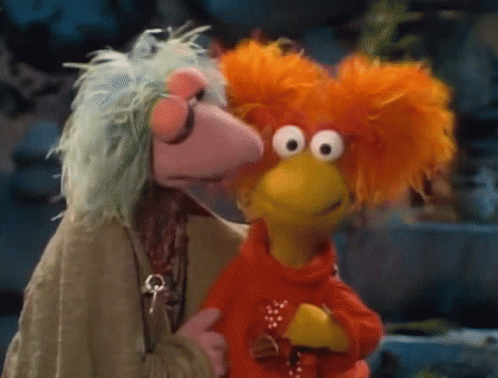 Two Muppets One With Orange Hair