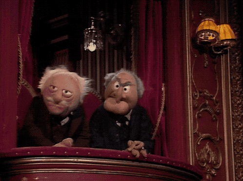Two Muppets Sitting On A Balcony With The Words Oh Please Don T Make Us Watch It Again GIF