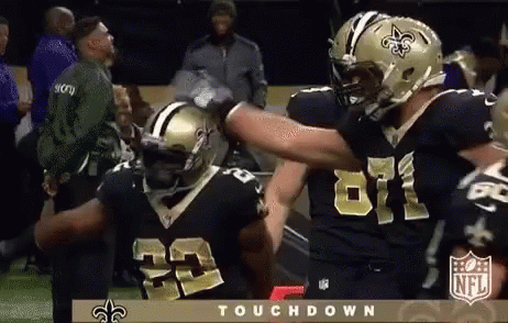 Two New Orleans Saints Players Hugging