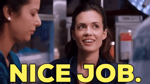 Two Nurses Are Talking To Each Other In A Hospital Room And One Of Them Is Smiling And Saying `` Nice Job '' . GIF
