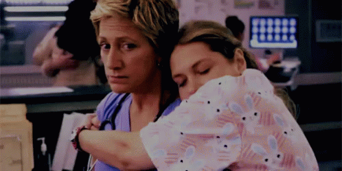 Two Nurses Hugging in Hospital