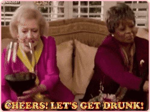 Two Older Women Drinking Wine and Dancing on Couch