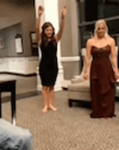 Two Older Women Toasting With Wine Girl's Date