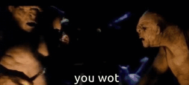 Two Orcs Are Standing Next To Each Other In A Dark Room With The Words `` You Wot '' Written In The Corner . GIF