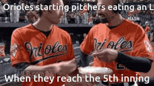 Two Orioles Baseball Players Eating L in 5th Inning