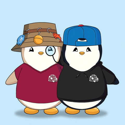 Two Penguins Standing, One Wearing Hat And Hoodie GIF