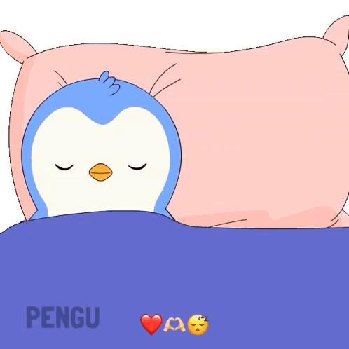 Two Penguins Laying Next to Each Other