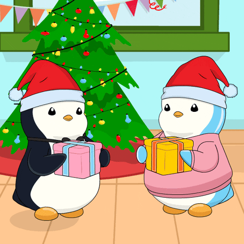 Two Penguins Wearing Santa Hats And Sweaters Are Holding Gifts In Front Of A Christmas Tree GIF