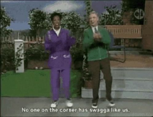 Two People Dancing in Front of No One on the Corner Has Swagga Like Us Sign