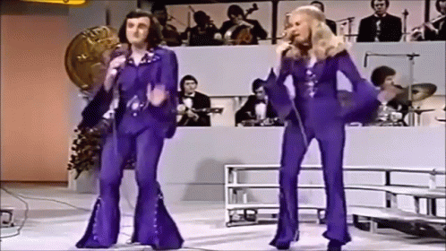 Two People Dancing in Purple Pants