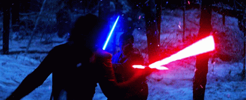Two People Fighting with Lightsabers