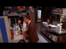 Two People Hacking Using One Keyboard GIF
