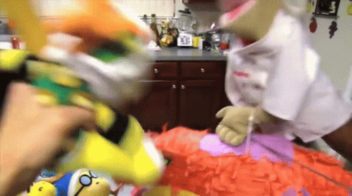 Two People Holding Stuffed Animals